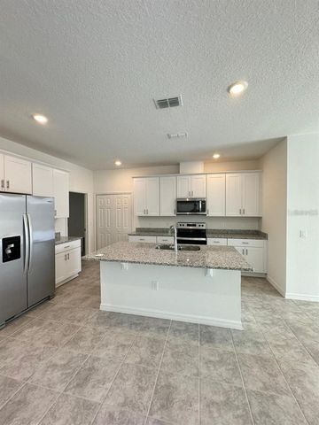2297 TREASURE HILL STREET, Minneola, FL 34715