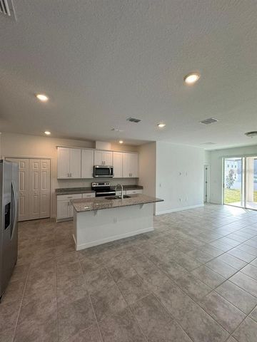 2297 TREASURE HILL STREET, Minneola, FL 34715