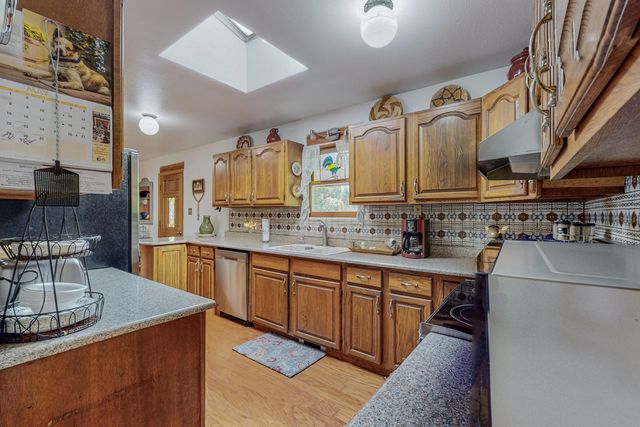 14 Entrada Del Jardin, Santa Cruz, NM 87567