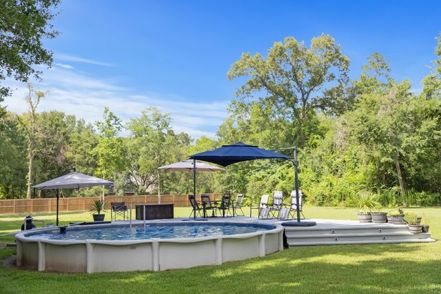 819 Sentinel Oaks, Pinehurst, TX 77362