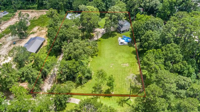 819 Sentinel Oaks, Pinehurst, TX 77362