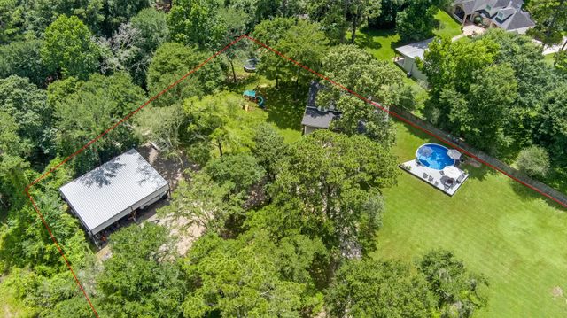 819 Sentinel Oaks, Pinehurst, TX 77362