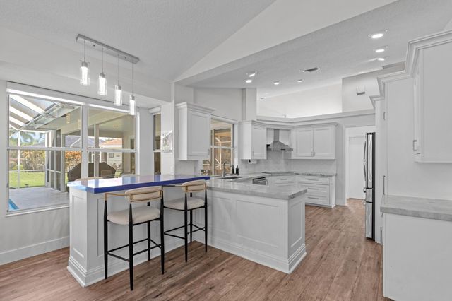 9061 Cypress Hollow Drive, Palm Beach Gardens, FL 33418