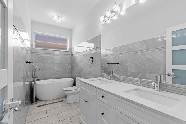 9061 Cypress Hollow Drive, Palm Beach Gardens, FL 33418