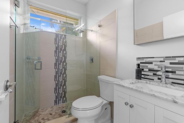 9061 Cypress Hollow Drive, Palm Beach Gardens, FL 33418