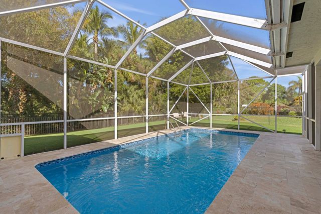 9061 Cypress Hollow Drive, Palm Beach Gardens, FL 33418