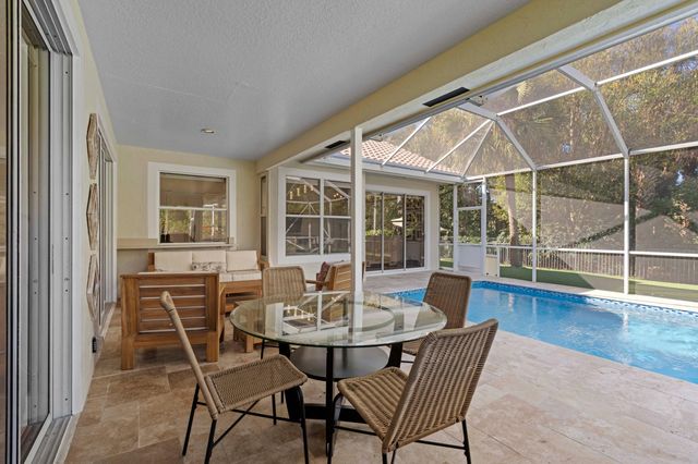 9061 Cypress Hollow Drive, Palm Beach Gardens, FL 33418