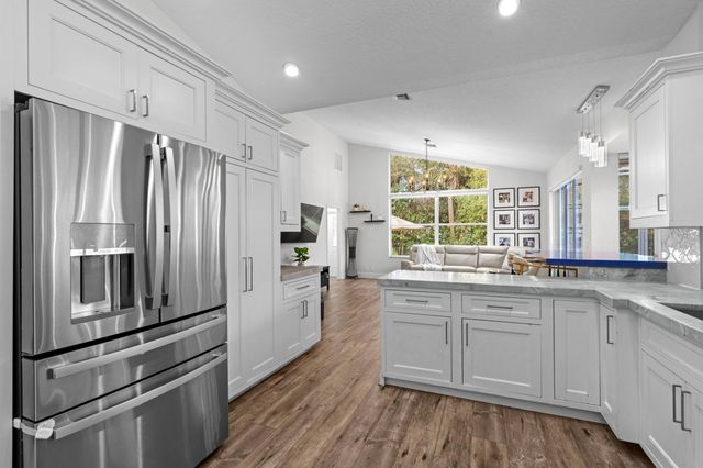 9061 Cypress Hollow Drive, Palm Beach Gardens, FL 33418