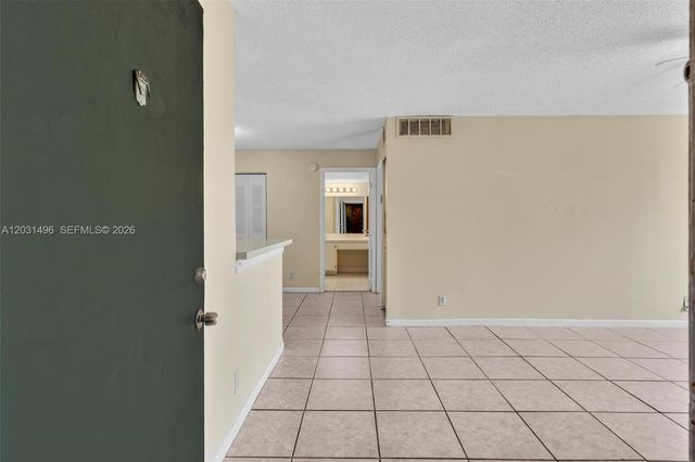 10765 Cleary Boulevard 104, Plantation, FL 33324