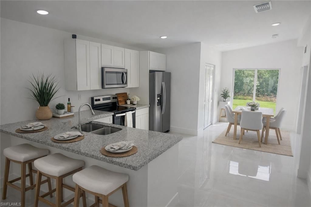 2905 26th ST W, LEHIGH ACRES, FL 33971 — photo 4