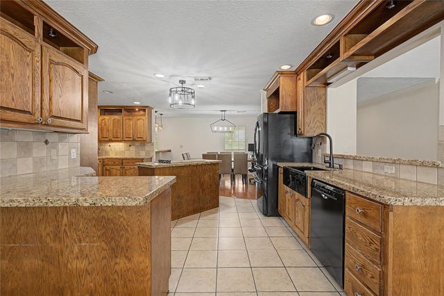 16558 Green Meadow Loop, Willis, TX 77318