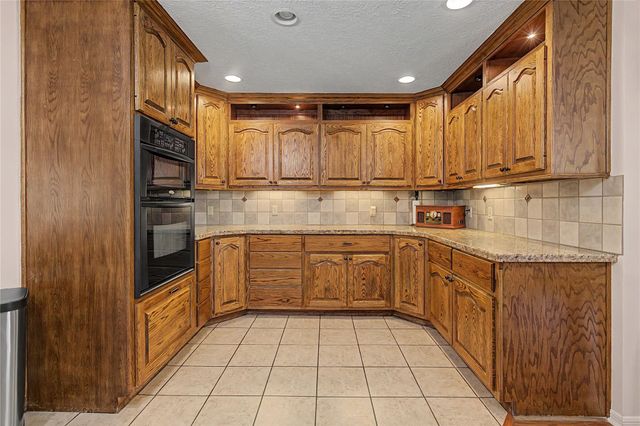 16558 Green Meadow Loop, Willis, TX 77318