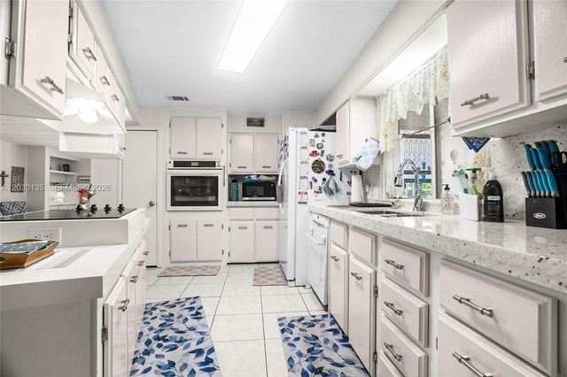 202 NW 52nd Court, Deerfield Beach, FL 33064