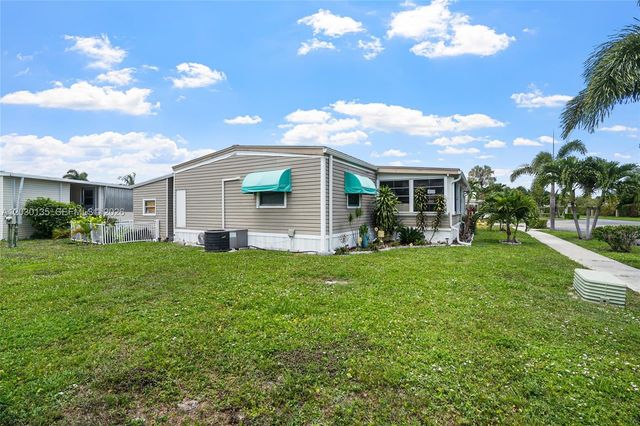202 NW 52nd Court, Deerfield Beach, FL 33064