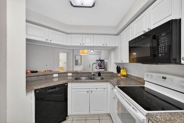 2727 Anzio Court 203, Palm Beach Gardens, FL 33410