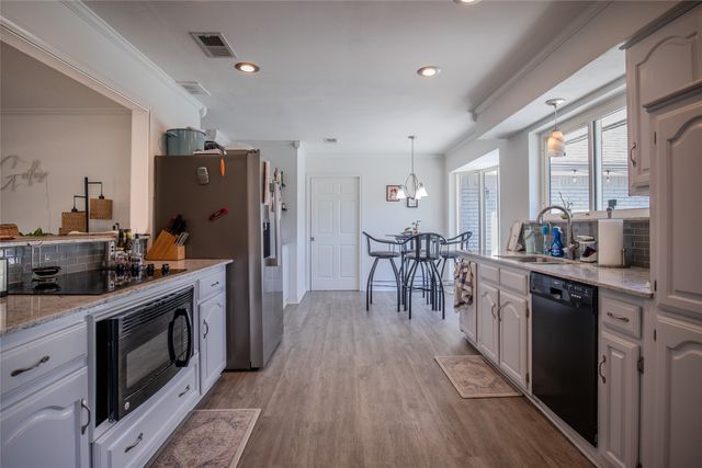 903 Village Green Drive, Rockwall, TX 75087