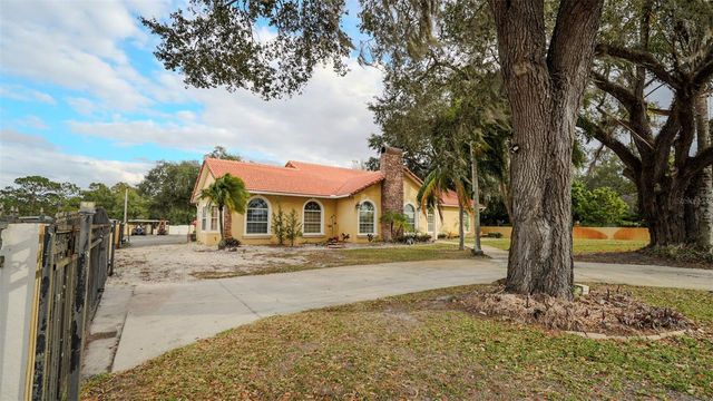14117 BOGGY CREEK ROAD, Orlando, FL 32824