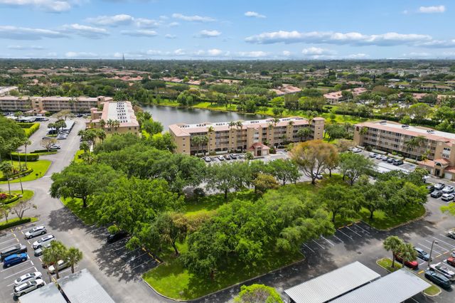5842 CRYSTAL SHORES Drive 205, Boynton Beach, FL 33437