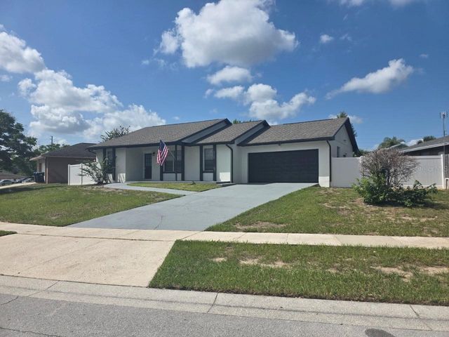 8426 VILLAGE GREEN RD, Orlando, FL 32818