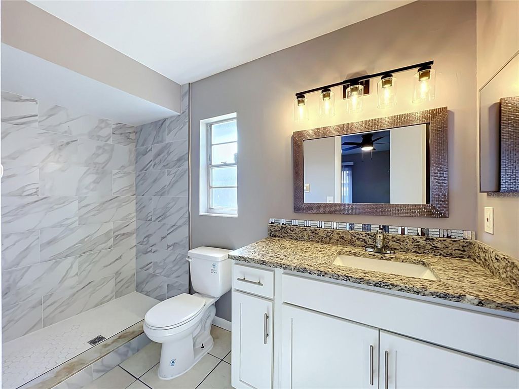 Image 28 of property listing at 8426 VILLAGE GREEN RD, Orlando, FL 32818
