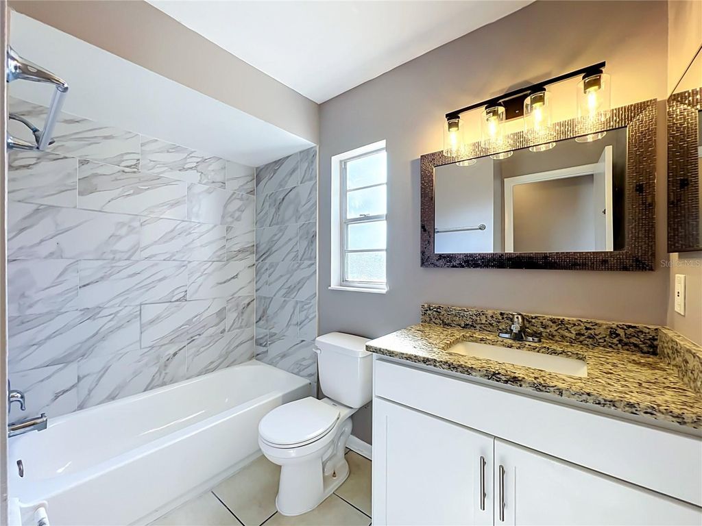 Image 31 of property listing at 8426 VILLAGE GREEN RD, Orlando, FL 32818