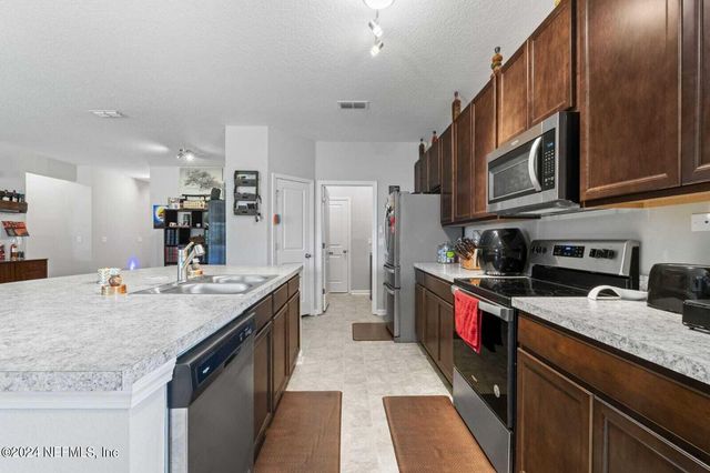 11595 DUNNS CROSSING Drive, Jacksonville, FL 32218