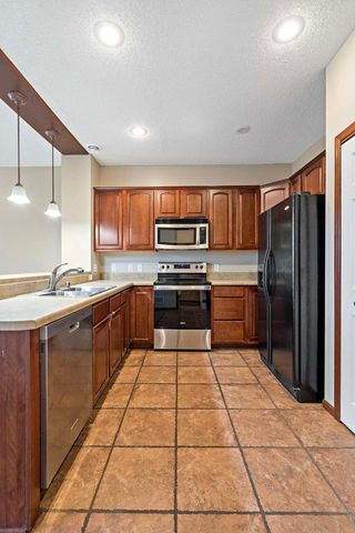 11003 Oak Grove Circle B, Woodbury, MN 55129