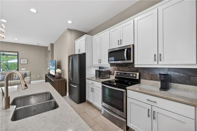 1310 Manado DR, Naples, FL 34113