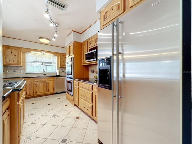 1112 CABALLO ROAD, Leesburg, FL 34748
