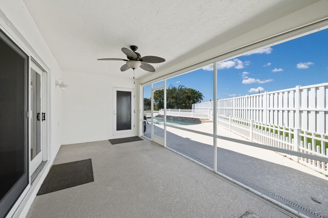 112 Camelot Court, Royal Palm Beach, FL 33411