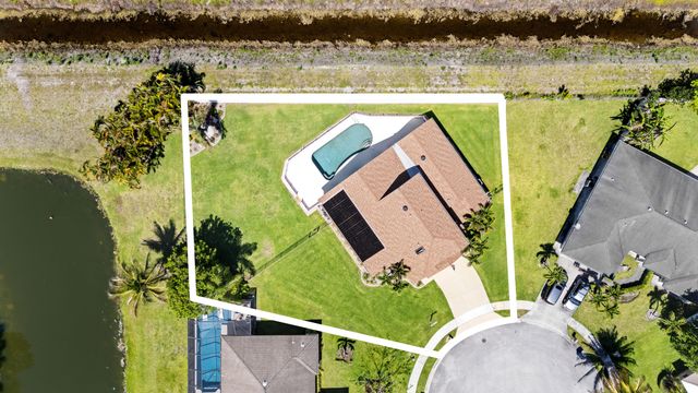 112 Camelot Court, Royal Palm Beach, FL 33411