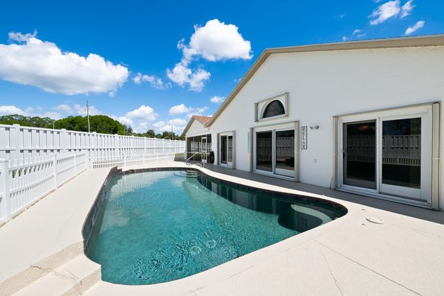 112 Camelot Court, Royal Palm Beach, FL 33411