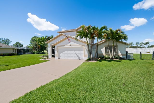 112 Camelot Court, Royal Palm Beach, FL 33411
