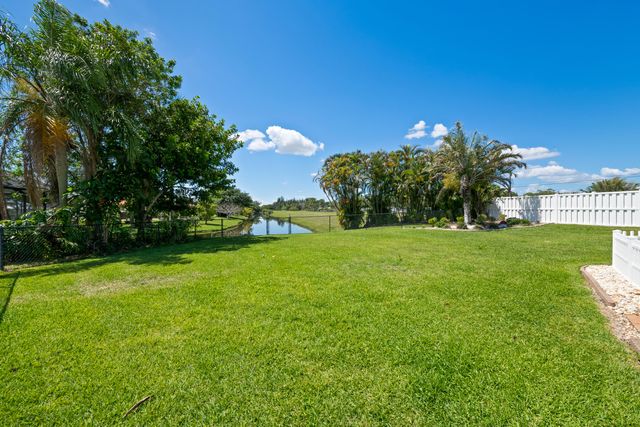 112 Camelot Court, Royal Palm Beach, FL 33411