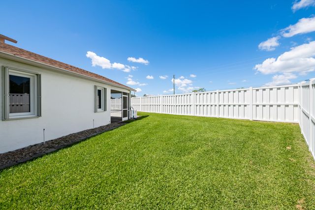 112 Camelot Court, Royal Palm Beach, FL 33411