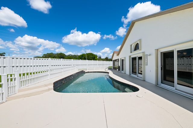 112 Camelot Court, Royal Palm Beach, FL 33411