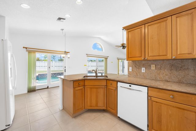 112 Camelot Court, Royal Palm Beach, FL 33411