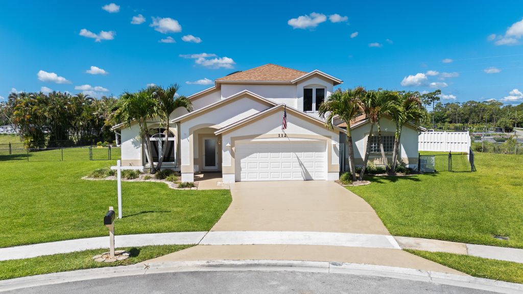 112 Camelot Court, Royal Palm Beach, FL 33411