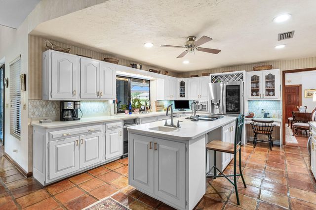 9 Alnwick Road, Palm Beach Gardens, FL 33418