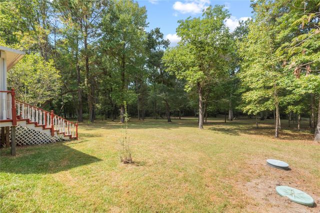 6702 W Bluff Drive, Magnolia, TX 77354