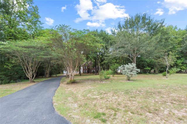 6702 W Bluff Drive, Magnolia, TX 77354