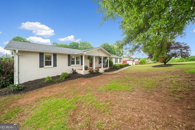3415 Trickum Road, Woodstock, GA 30188