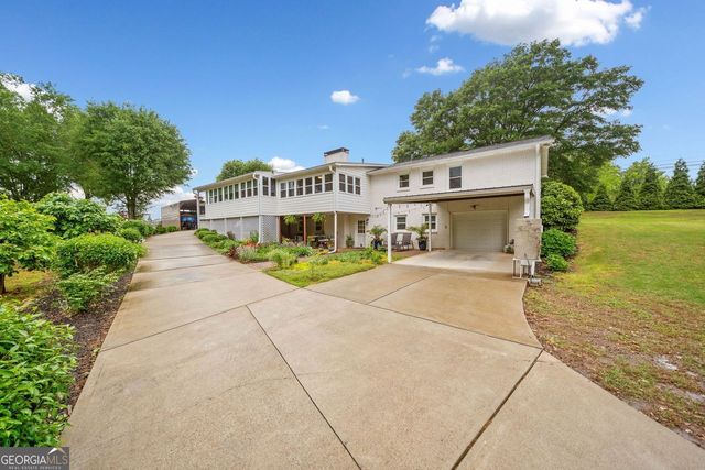 3415 Trickum Road, Woodstock, GA 30188