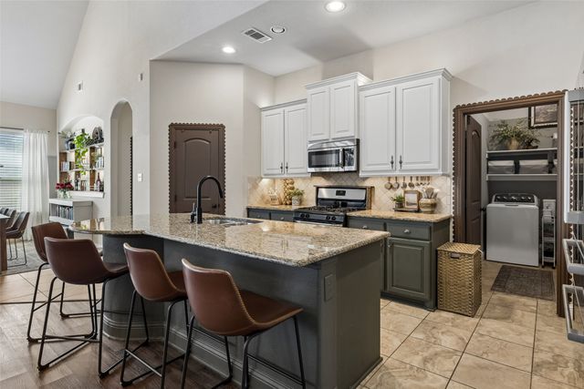 906 Bald Cypress Drive, Fate, TX 75087