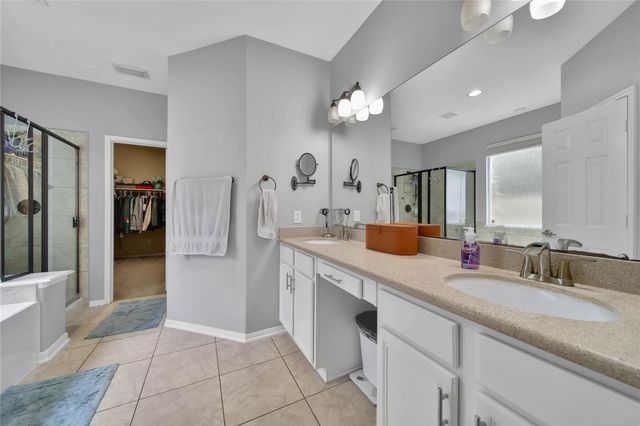 6 Loxanhachee Place, Spring, TX 77389