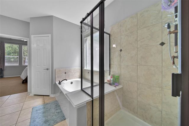6 Loxanhachee Place, Spring, TX 77389