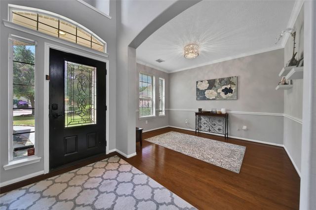 6 Loxanhachee Place, Spring, TX 77389