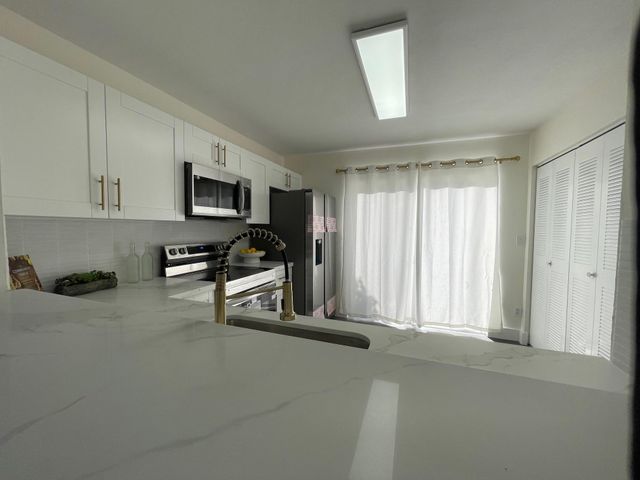 5916 Woodland Point Place, Tamarac, FL 33319