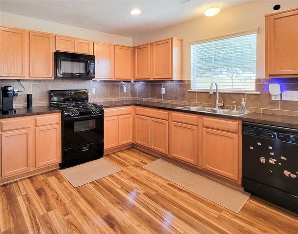 7726 Sagemark Ridge Drive, Cypress, TX 77433