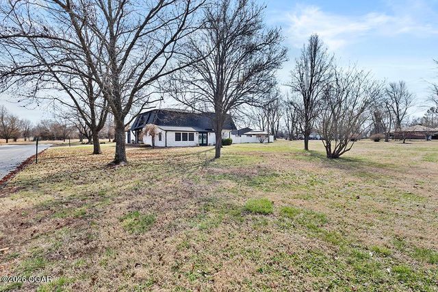 606 Meadowmere Drive, Webb City, MO 64870